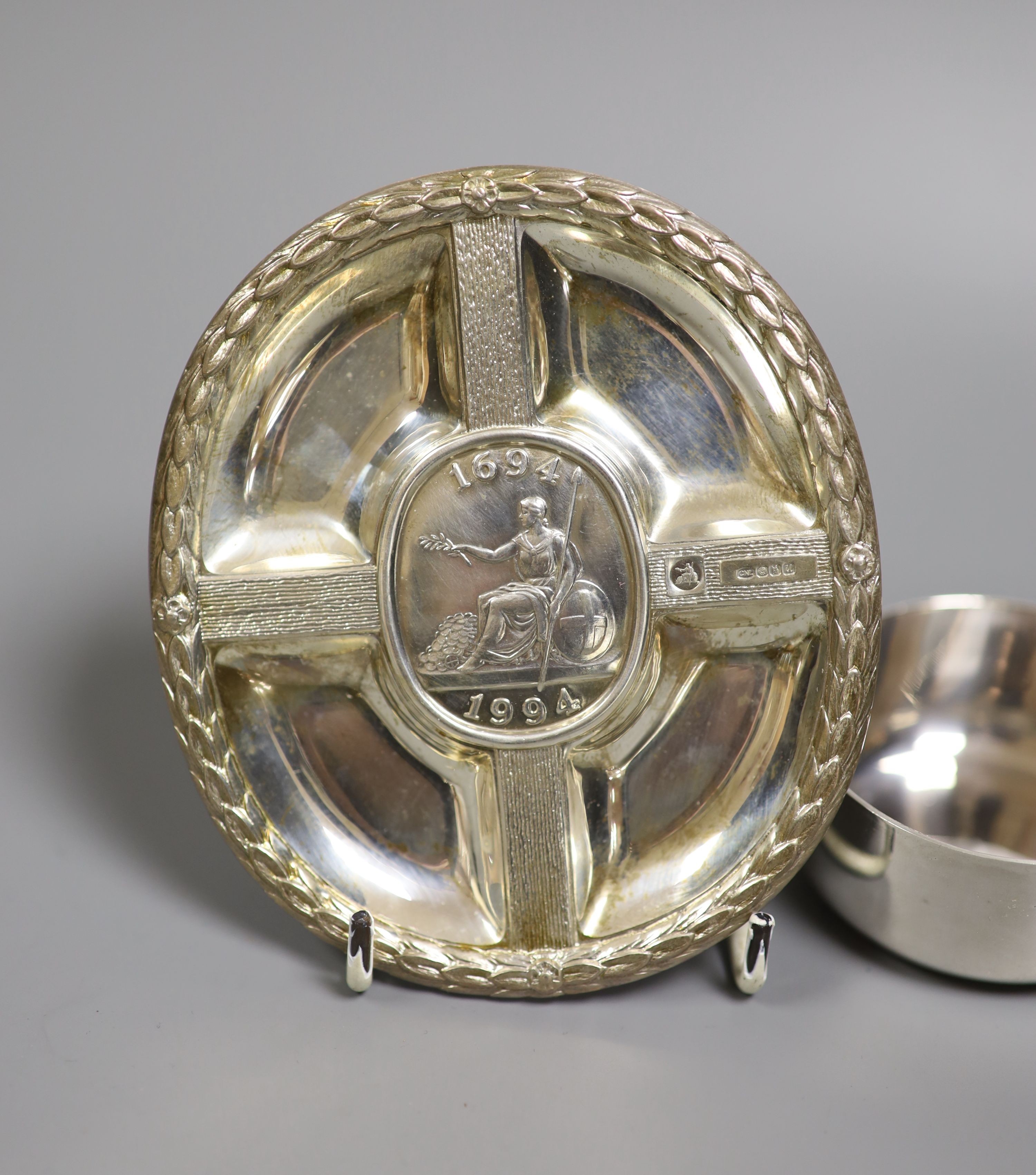 A modern silver pot and cover, decorated with St. George & The Dragon, diameter 61mm and a cased silver plaque, both by Christopher Nigel Lawrence.